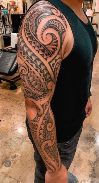 A tribal tattoos for men, featuring bold tribal symbols and patterns.