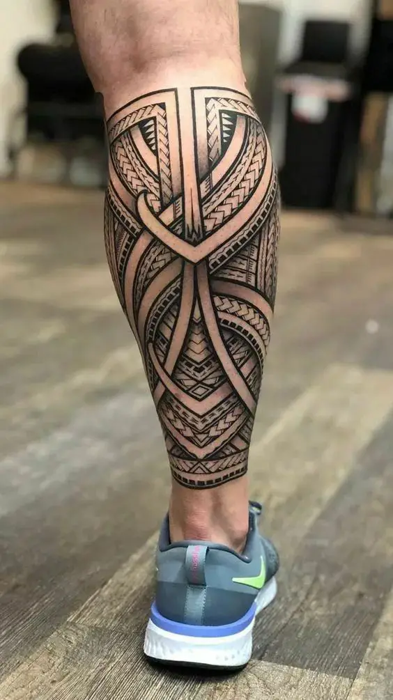 A leg tattoos for men with strong bold lines and shapes