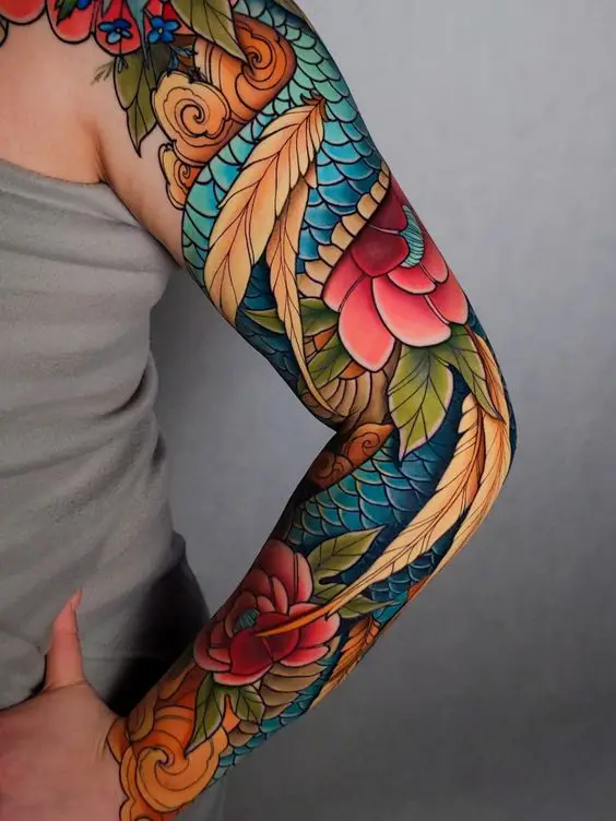 A colorful neo-traditional tattoo on full arm