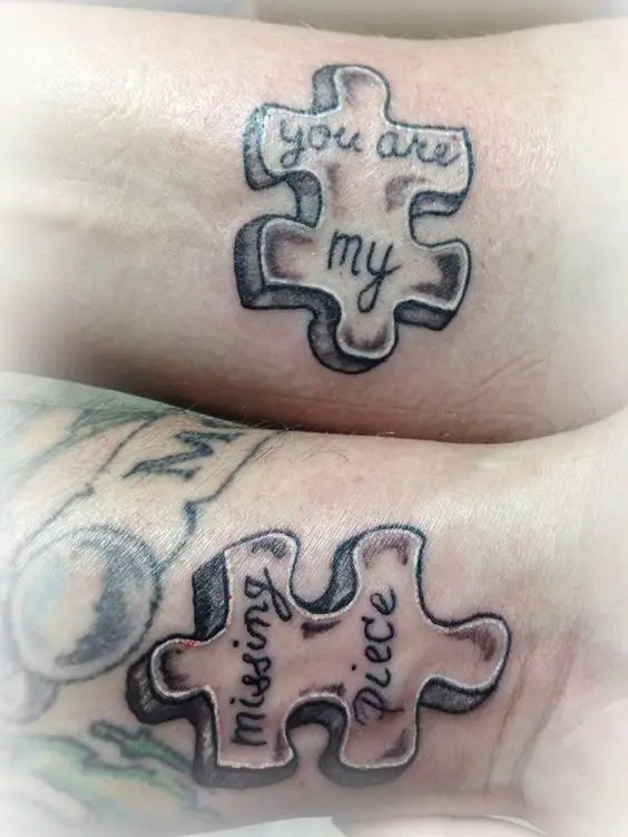 Puzzle Pieces Couple Tattoo